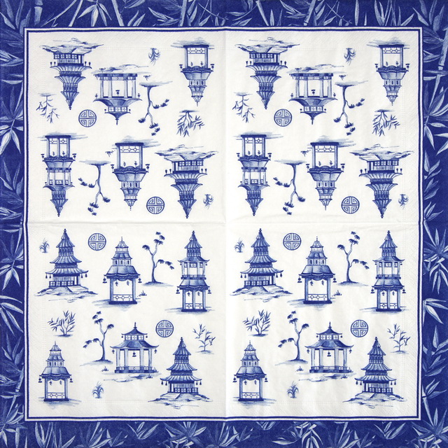 a blue and white tablecloth with a pattern of buildings and trees