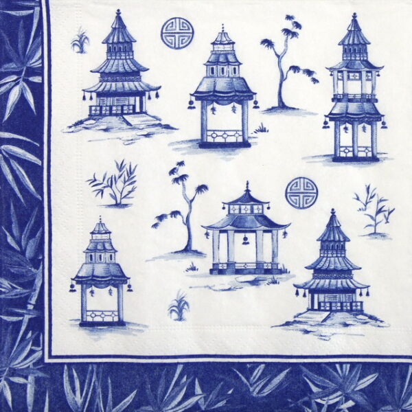 a blue and white napkin with a pattern of buildings and trees