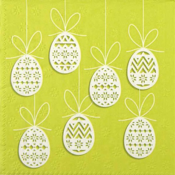 paper napkin hanging white easter eggs on apple green base