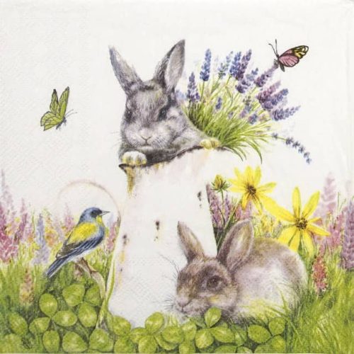 a napkin with rabbits and flowers