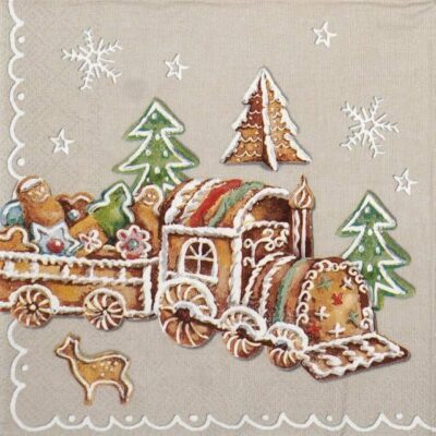 Gingerbread Valley decoupage napkin with gingerbread train, icing‑decorated houses, festive trees and reindeer on a cream background.