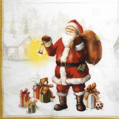 Gold Happy Santa decoupage napkin with traditional Santa holding a glowing lantern and toy sack in a snowy village scene.
