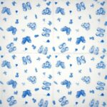 Unfolded 20 pcs lunch paper napkins pack baby shoes and bottles showing a four-panel pattern for decoupage napkins.