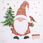 Quarter view of the Christmas Buddy napkin showing the festive gnome with winter bird and golden stars.