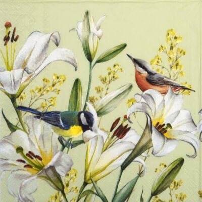 Close-up of bird napkins for table decor showing details of the blue tit and lilies.