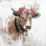 Painted cow with floral crown on a textured white background.