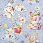 Tea Cups blue decoupage napkin with vintage teapots, cups, and floral design for botanical crafts on a blue background.