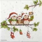 Close-up detail of the Owl Family napkin showing cute Christmas owls on a snowy branch