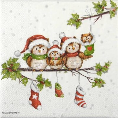 Close-up detail of the Owl Family napkin showing cute Christmas owls on a snowy branch
