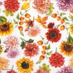 Close-up detail of the Autumn Blooming cocktail napkin showing sunflowers, red dahlias, and Chinese lanterns on a white background.