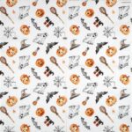 Open view of the Happy Halloween napkin showing a full-sheet pattern of repeating pumpkins, ghosts, bats, and witch accessories.